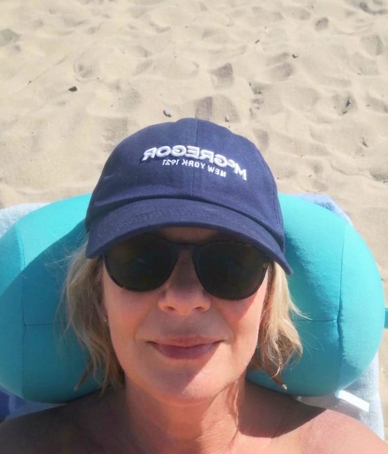 Sanja swimming and relaxing in her cap under Azure Equilibrium